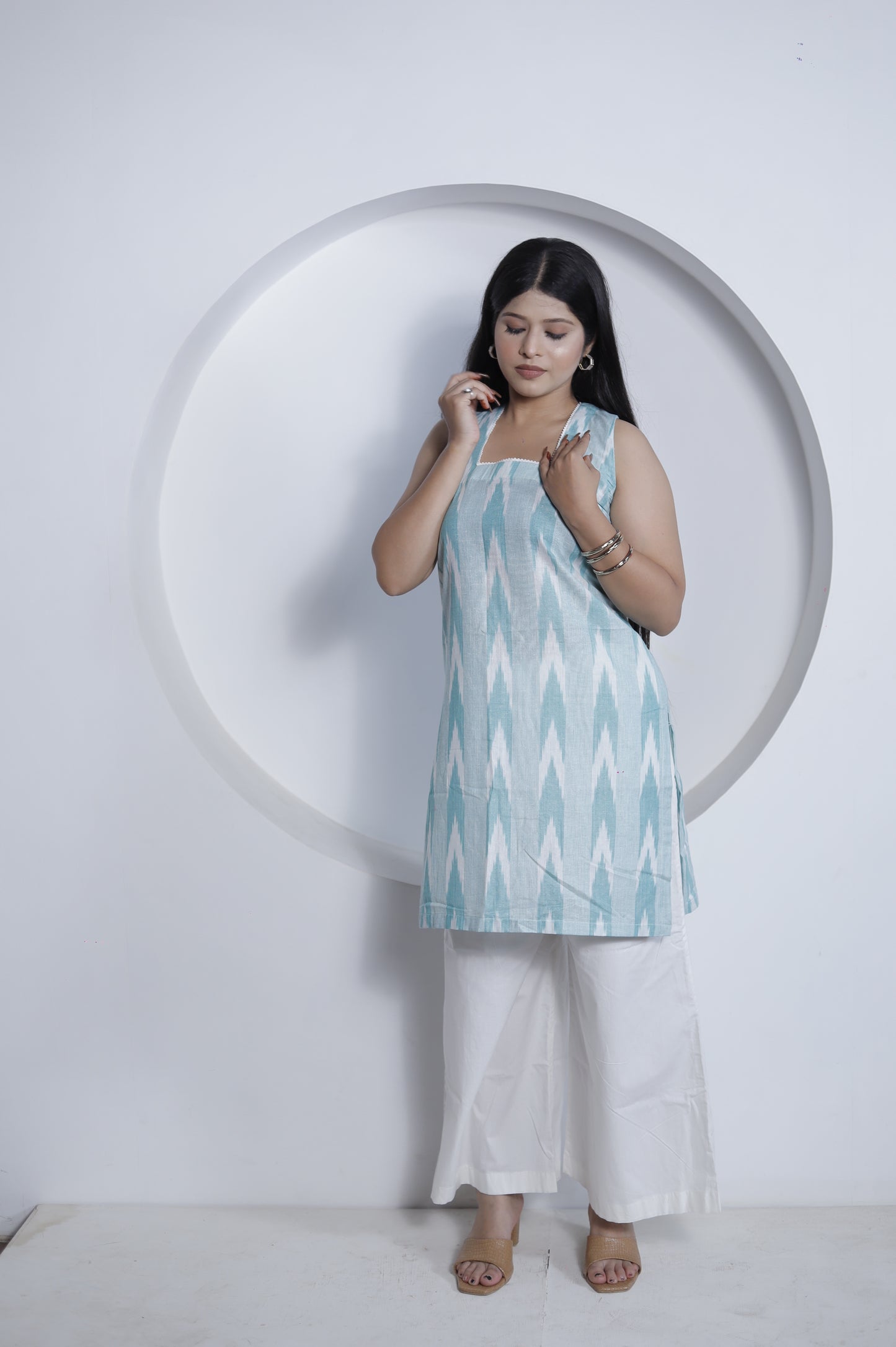 Mint Green Ikat Print Sleeveless Kurta with White Palazzo – Elegant Summer Ethnic Wear for Women